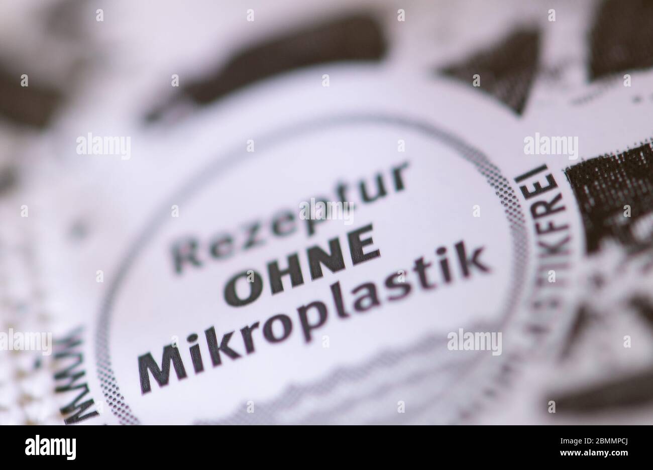 26 April 2020, Berlin: The lettering 'Rezeptur ohne Mikroplastik' is written on the packaging of a drugstore product in a circle. Photo: Soeren Stache/dpa-Zentralbild/ZB Stock Photo