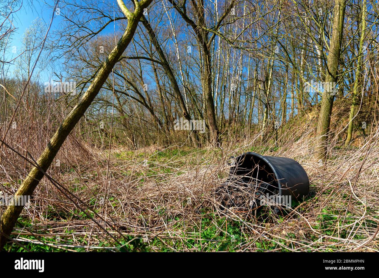 Plastic waste on a covered landfill in northwest Germany near Bad Iburg Stock Photo