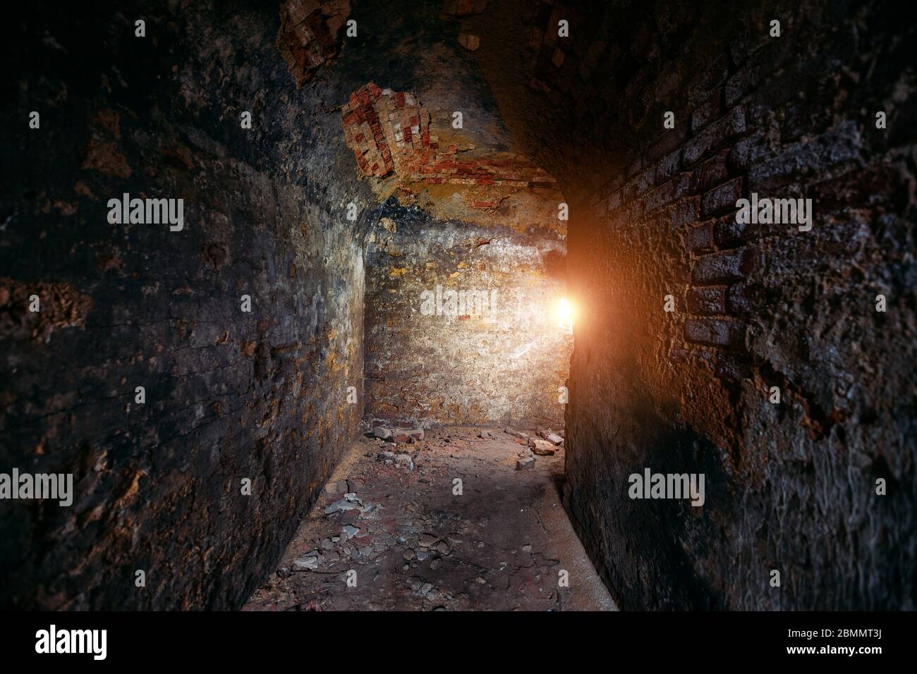 Historical underground red brick passage under old city Stock Photo