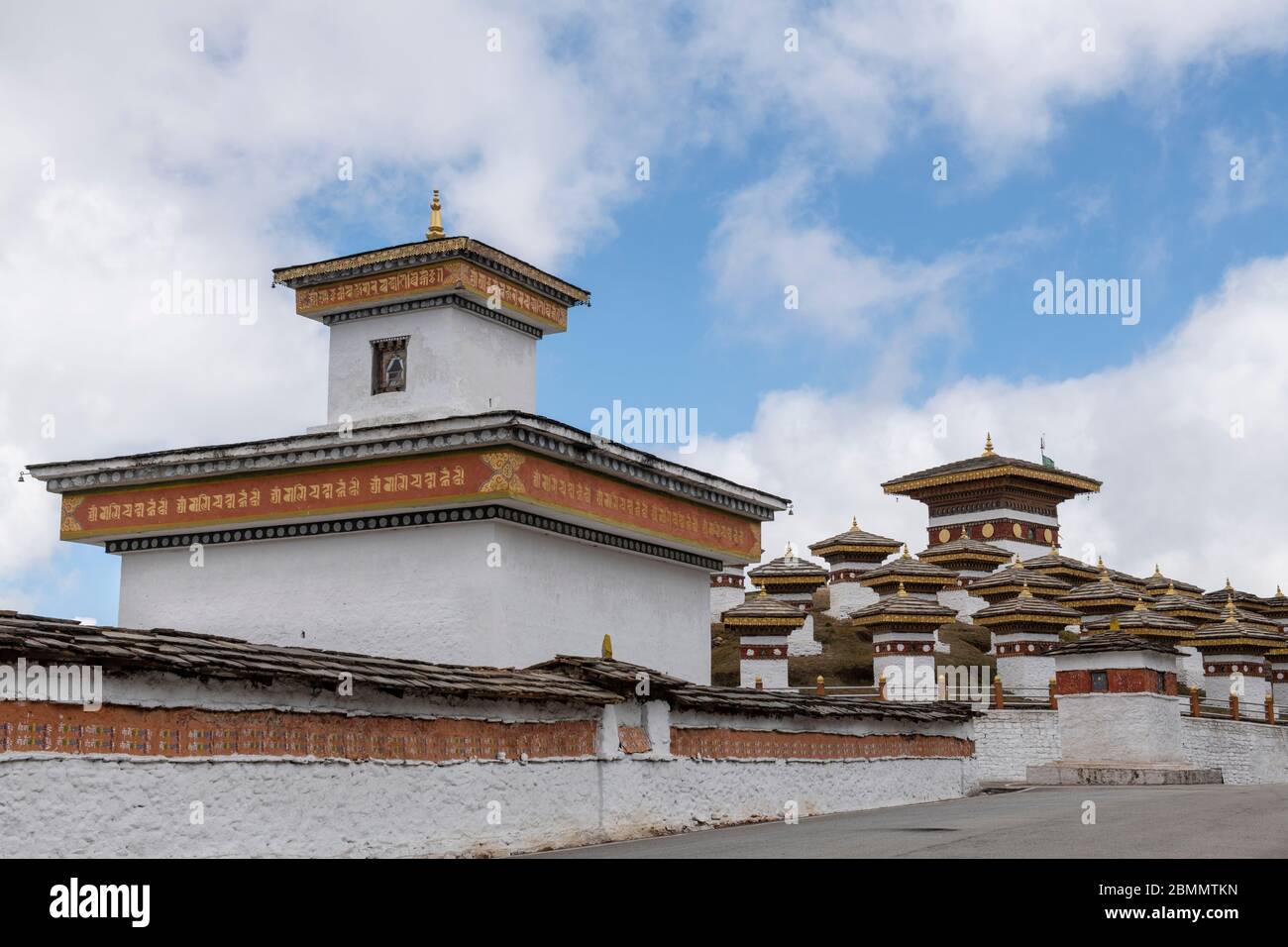 Bhutan, Dochula Pass, Druk Wangyal Khang Zhang Chortens. 108 red-bandedaka khangzang chortens built as memorial to Bhutanese soldiers killed in 2003 b Stock Photo