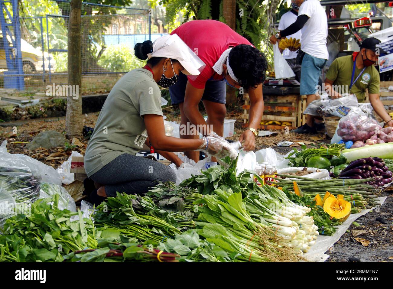 Antipolo City, Philippines - May 7, 2020: Vendors and customers of a mobile  palengke or market organized by the local government in a community during  Stock Photo - Alamy