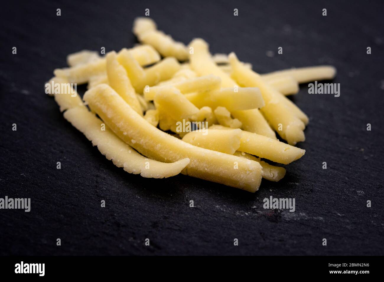 Grated cheese Stock Photo