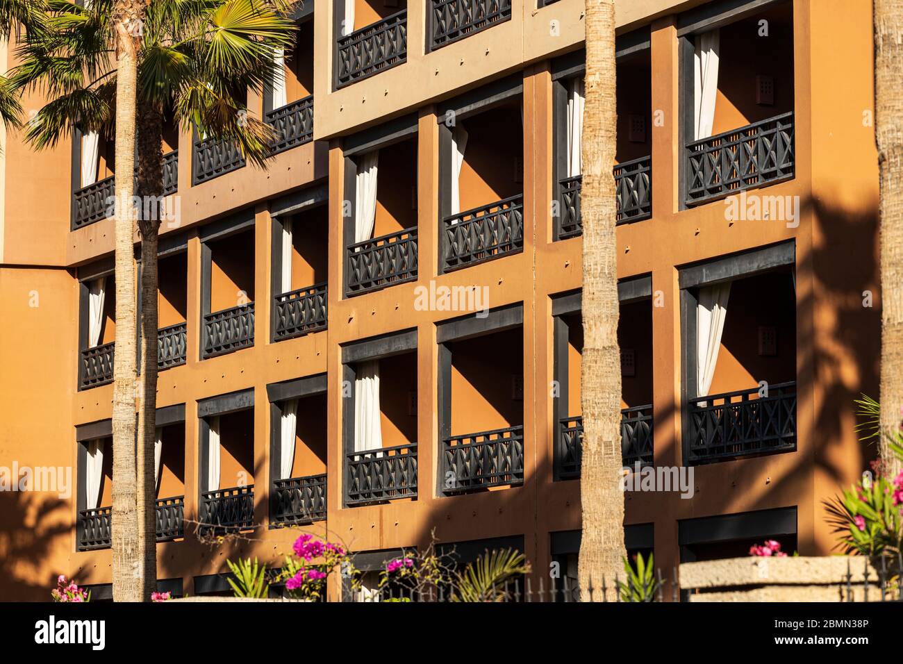 Empty, deserted balconies on the hotel H10 Costa Adeje Palace during the covid 19 lockdown in the tourist resort area of Costa Adeje, Tenerife, Canary Stock Photo