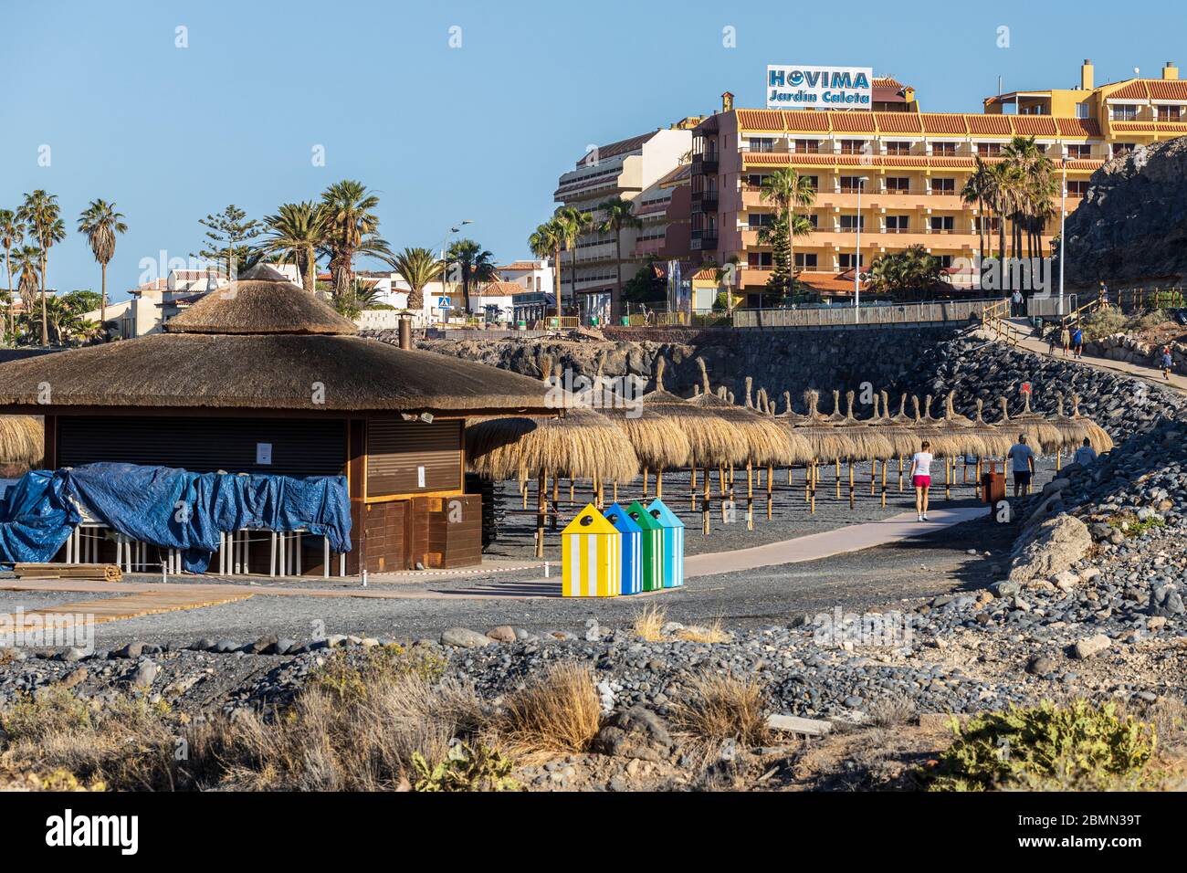 Early morning excercise on the Playa Enramada in the first phase of de-escalation during the covid 19 lockdown in the tourist resort area of Costa Ade Stock Photo