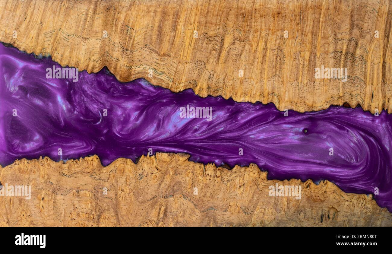 Casting epoxy resin stabilizing maple wood background texture Stock