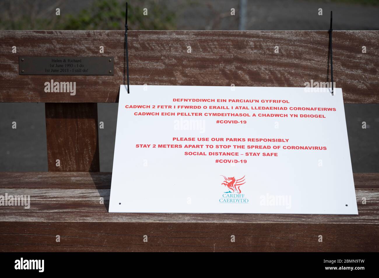 Social distancing measures on a bench in Cardiff, Wales, UK, by Cardiff County council. Stock Photo