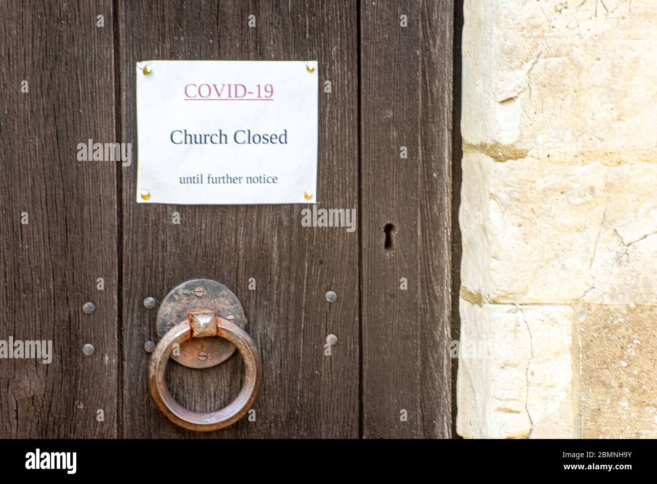 Coronovirus sign, church closed due to Covid-19, St James's Church, Upper Wield, Hampshire, UK Stock Photo