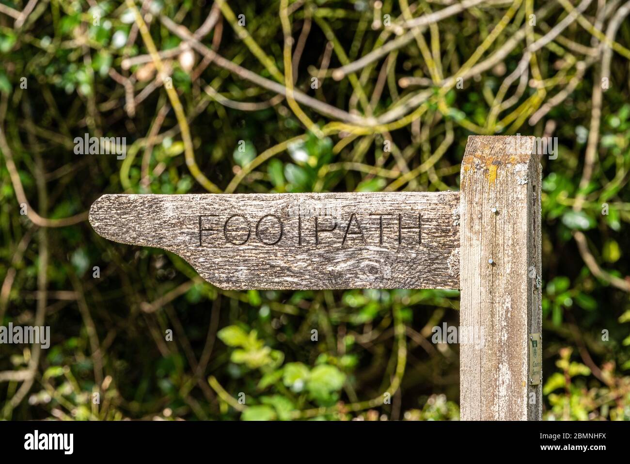 Old wooden footpath sign, Upper Wield, Hampshire, UK Stock Photo