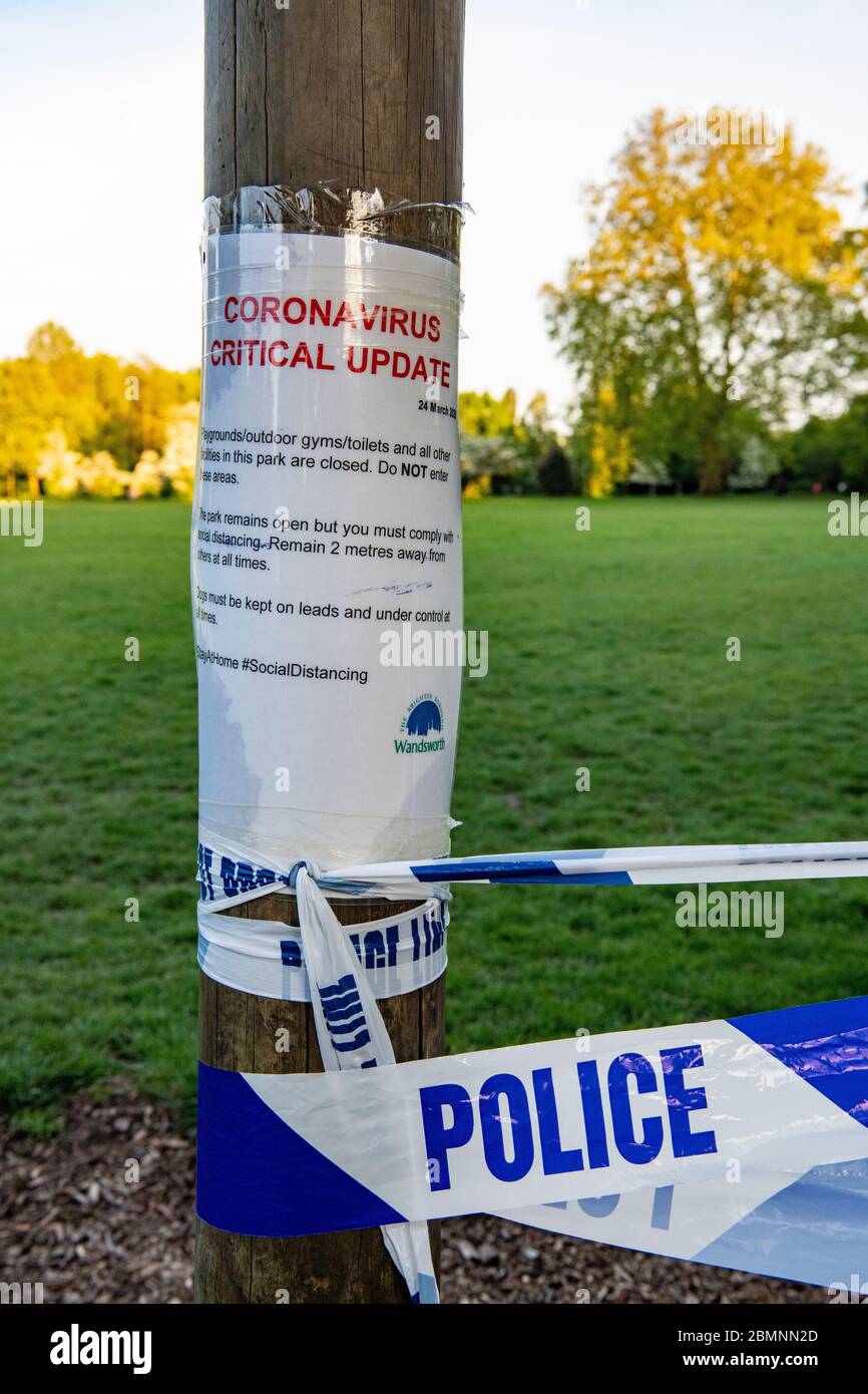 A sign in a London park warning against using the gym equipment during ...