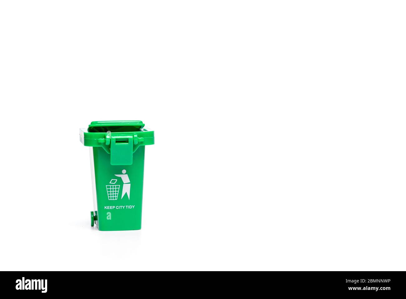 Green garbage, trash bin isolated on white background Stock Photo Alamy