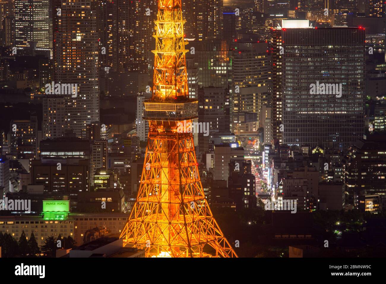 Tokyo / Japan - April 20, 2018: Tokyo Tower and Tokyo cityscape at night, view from the Roppongi Hills Mori Tower Stock Photo