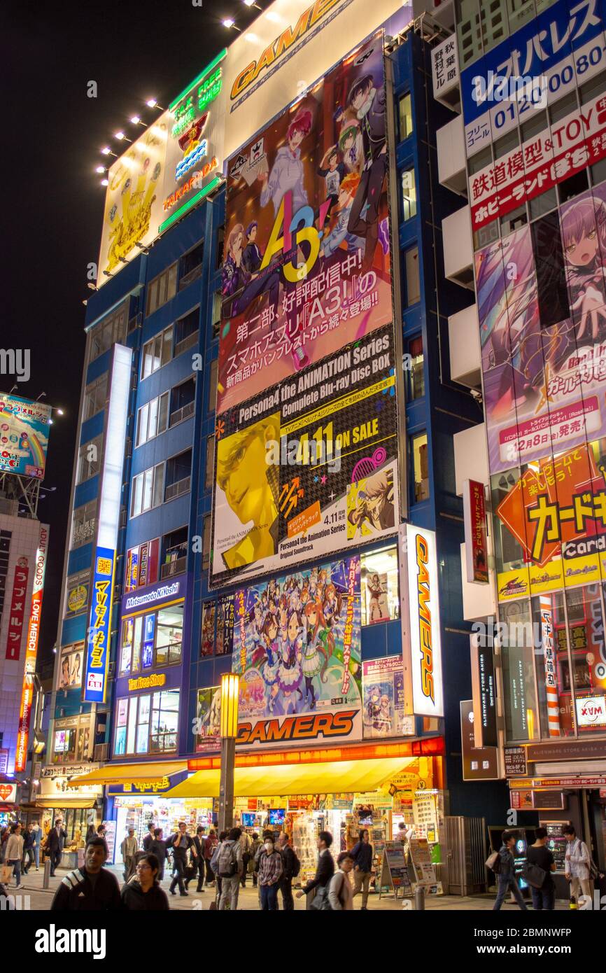 Tokyo / Japan - April 20, 2018: Advertisement neon lights of the Akihabara Electric Town Akihabara Denki Gai, shopping district for video games, anime Stock Photo