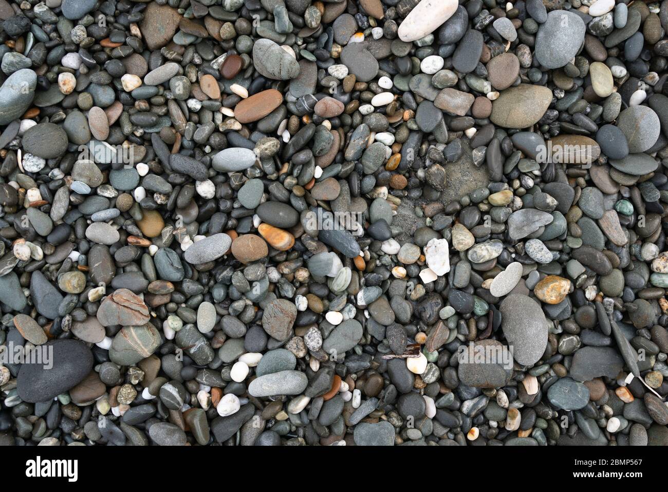 Abstract background texture of random coloured and small sized smooth ...