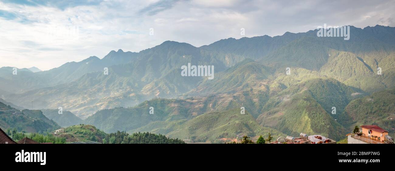 Panoramic view of the Sa Pa valley and mountain range, under morning light, Sa Pa, Vietnam Stock Photo