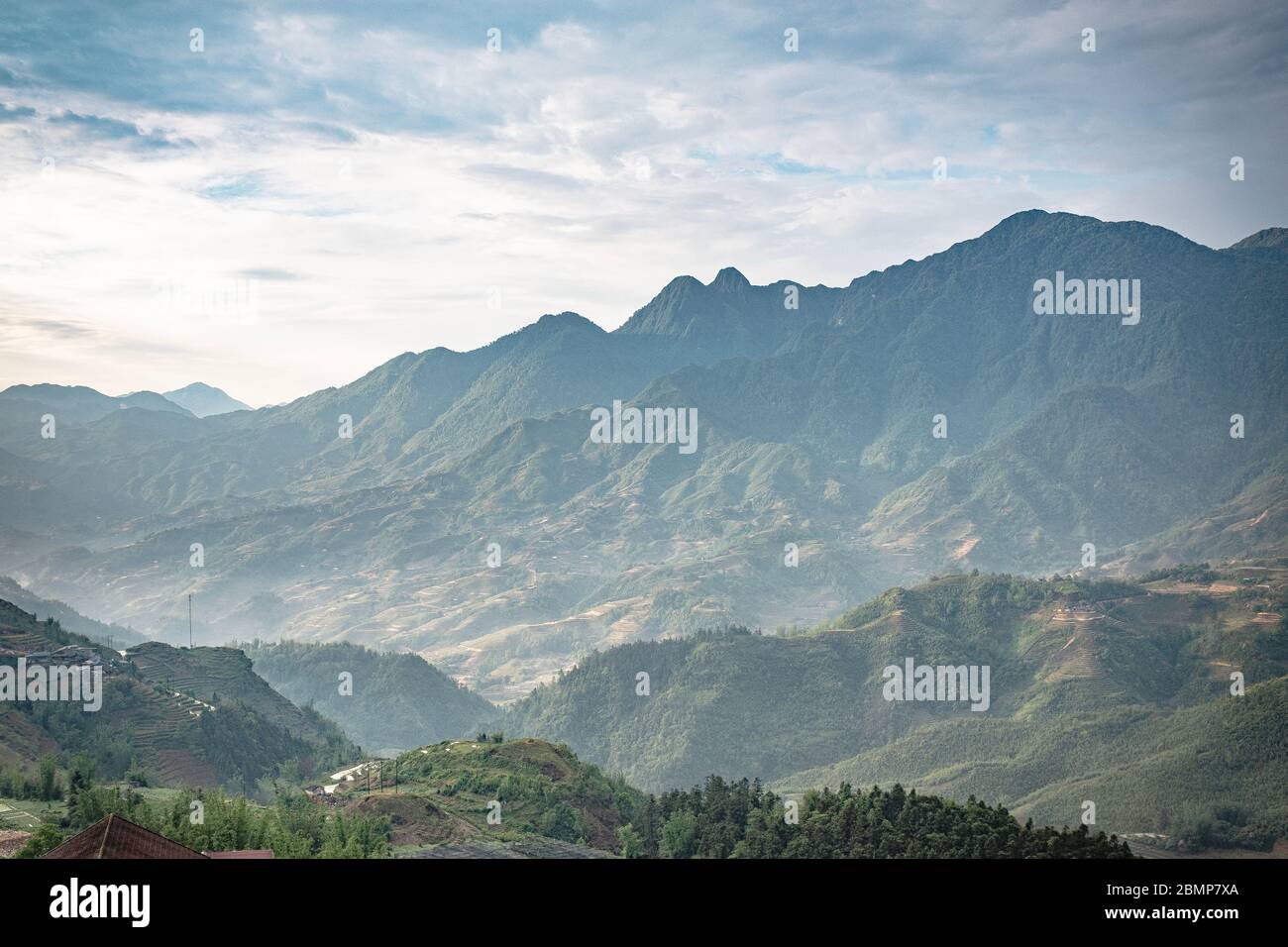 Panoramic view of the Sa Pa valley and mountain range, under morning light, Sa Pa, Vietnam Stock Photo