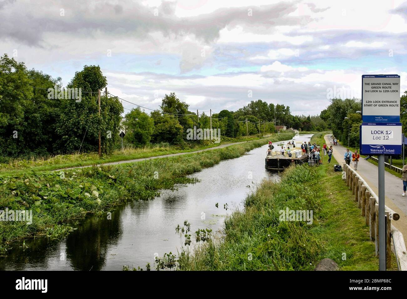A barge moored in the Grand Canal near the 12th  Lock at Lucan, Dublin, Ireland, providing tours as part of Heritage Week. Stock Photo