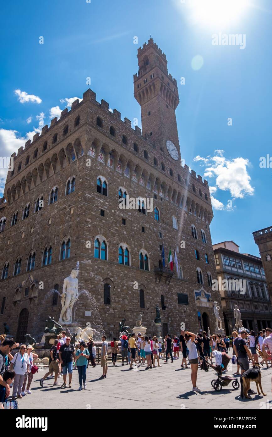 Florence, Italy - August 16, 2019: Piazza della Signoria with Palazzo Vecchio in Florence, Tuscany, Italy Stock Photo