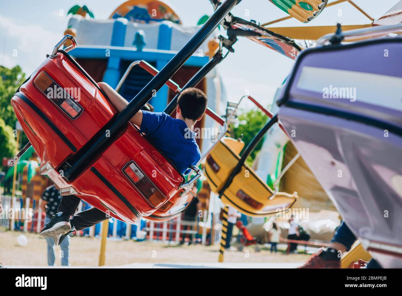 The vibrant colors of the Chair-O-Planes ride at the carnival Stock ...