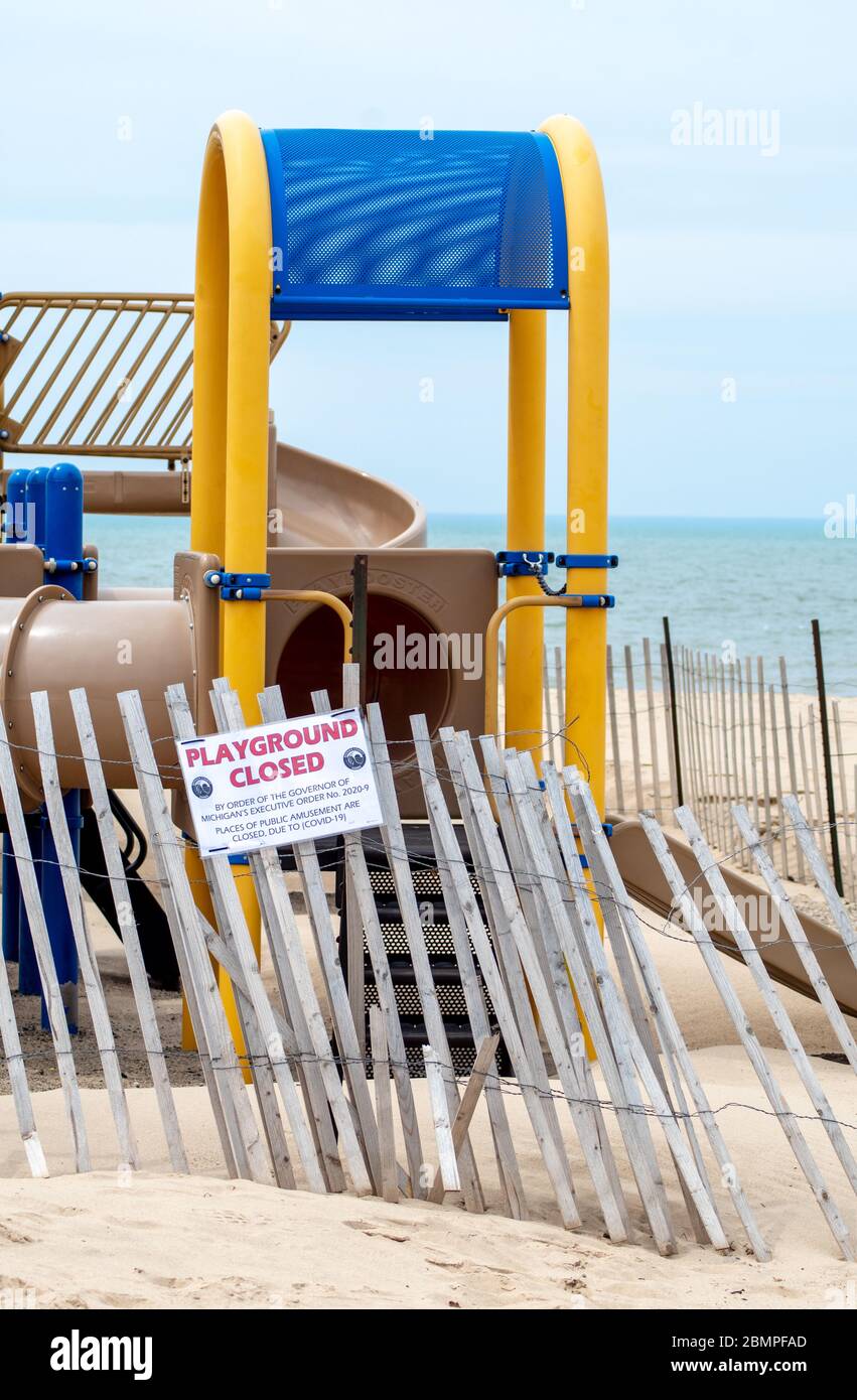 Closed playground on the shores of Lake Michigan in Michigan USA, as the world shuts down under quarantine Stock Photo