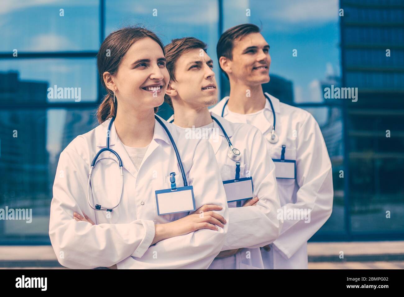 close up. group of confident medical professionals standing in a row ...