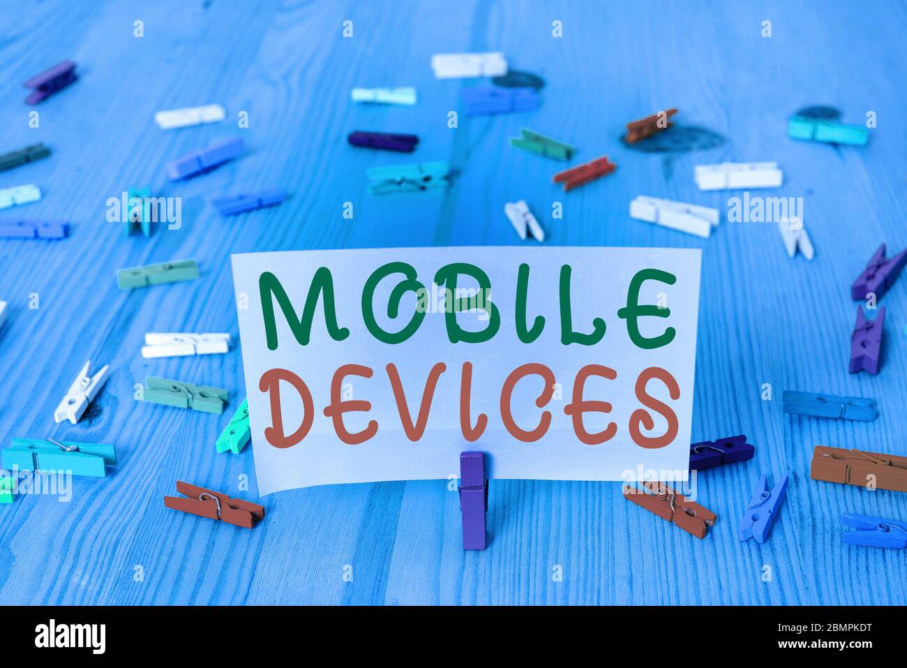 Conceptual hand writing showing Mobile Devices. Concept meaning A portable computing device like