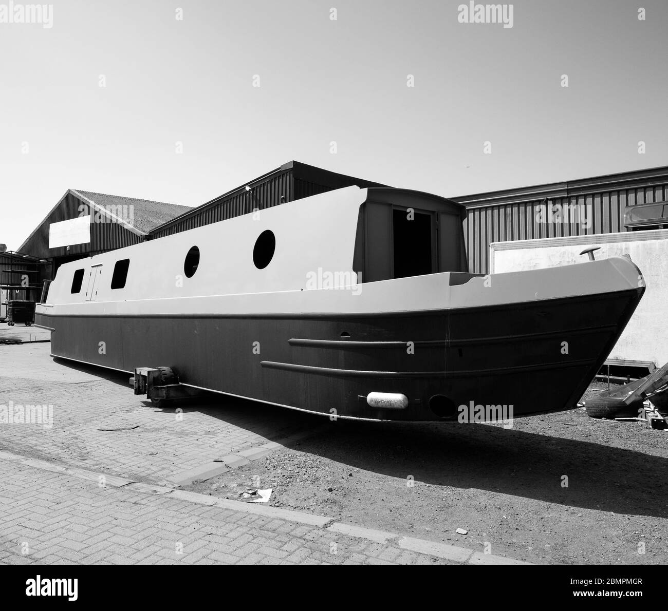 New canal narrow boat at a builders yard Stock Photo Alamy