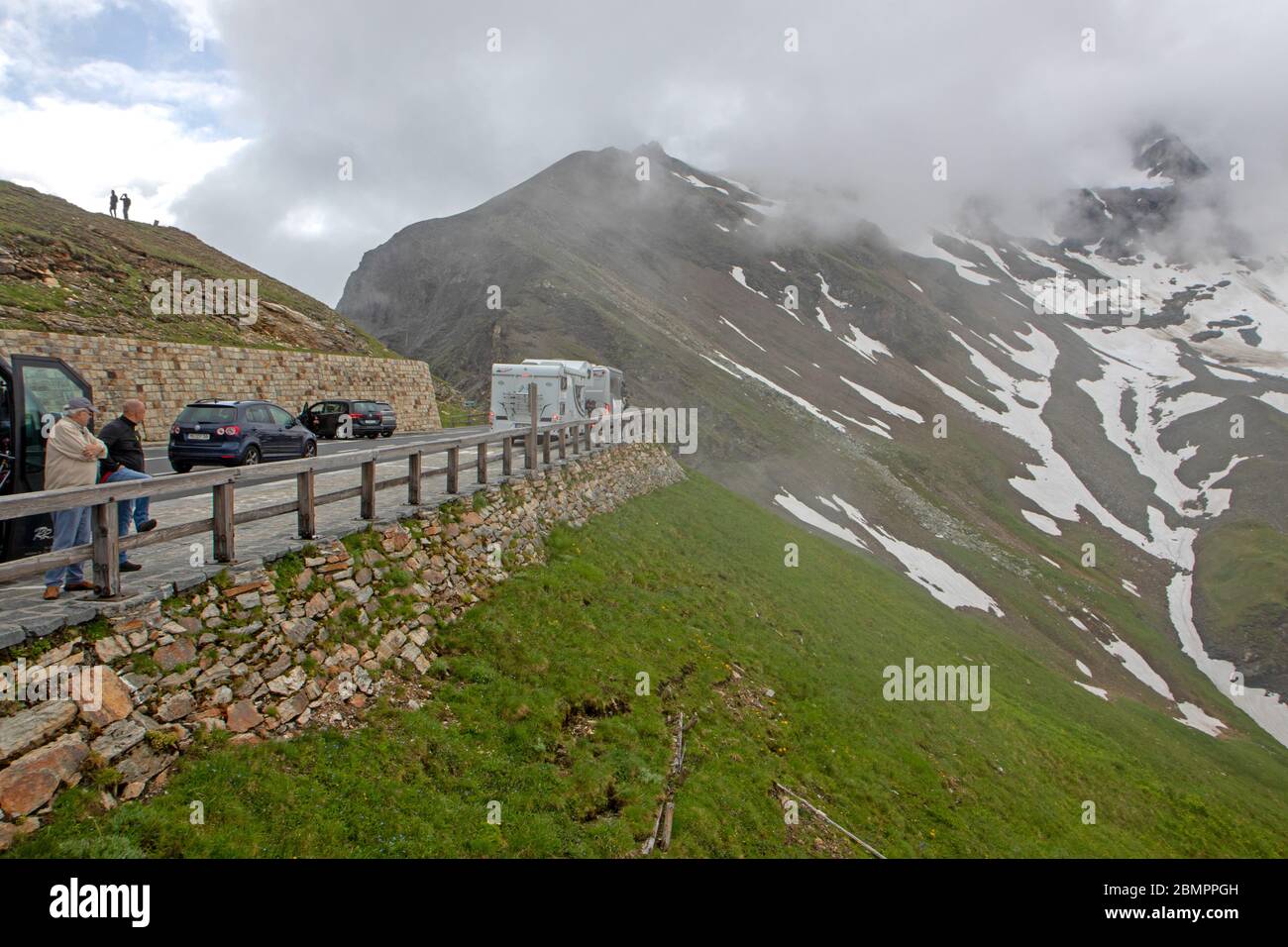 Visitors at the high point of the Grossglockner High Alpine Road Stock Photo