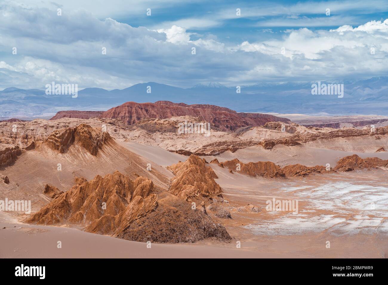 Surreal landscapes at the Moon Valley (Spanish: Valle de La Luna ) near San Pedro de Atacama in Chile, South America. Stock Photo