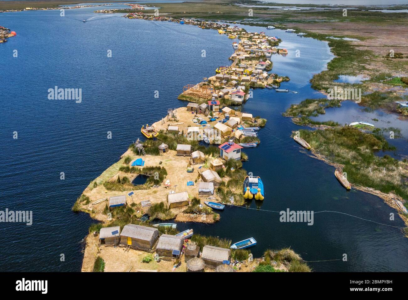 Aerial view of Uros Floating Islands on Lake Titicaca, the highest navigable lake in the world, in Peru, South America. Stock Photo