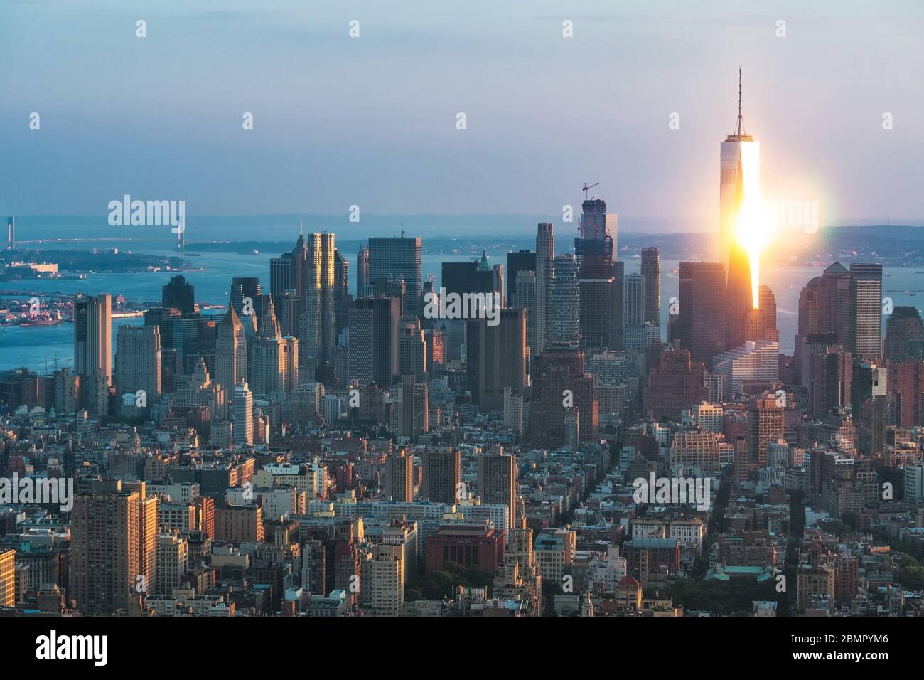 Skyline of New York City showing Lower Manhattan buildings at sunset in New York, United States of America. Stock Photo