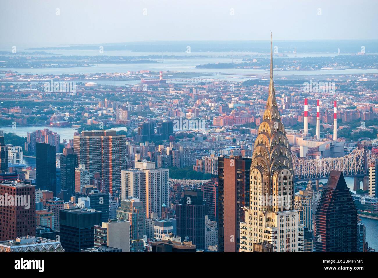 New York City skyline including architectural landmark Chrysler Building in Manhattan, New York, United States of America. Stock Photo