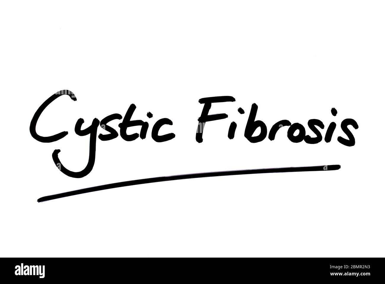 Cystic Fibrosis handwritten on a white background. Stock Photo
