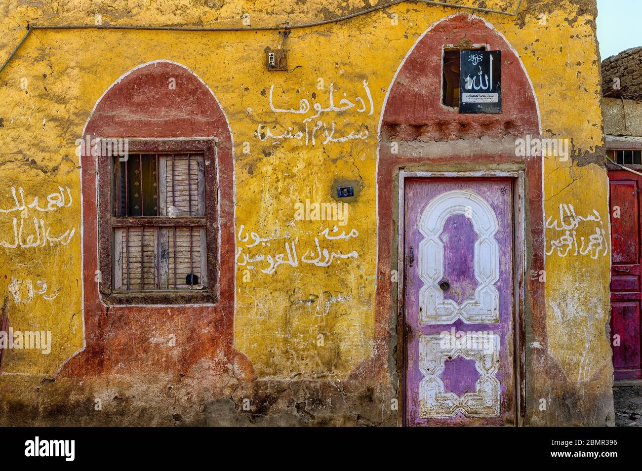 Front wall of a Brightly painted house in a rural village of Tod, South of Luxor Stock Photo