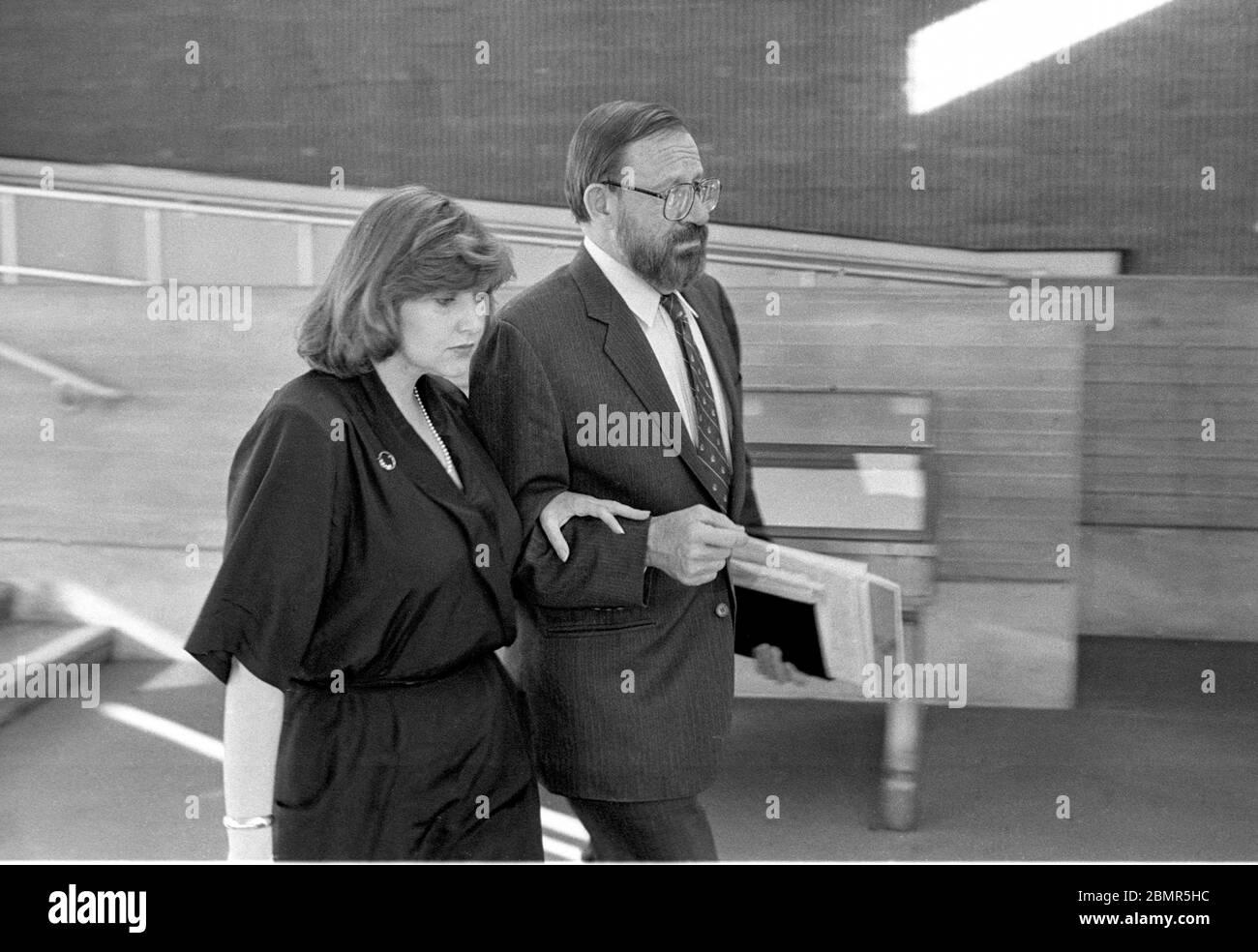 Wall Street securities analyst Joseph Pikul, right, with his third wife, Mary Bain  at the Orange County Courthouse where is tried for the murder of his second wife, Diane Whitmore, at the Goshen, NY on January 20, 1989. Photo by Francis Specker Stock Photo