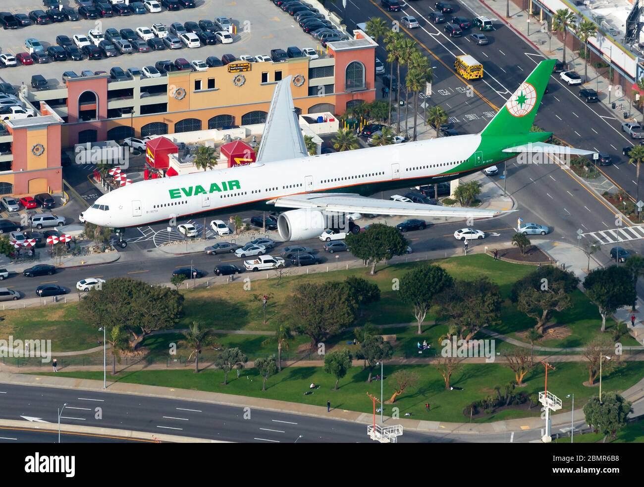 Eva Air Boeing 777 on final approach to Los Angeles International Airport. Aircraft registered as B-16713. B777 seen from above. High view. Stock Photo