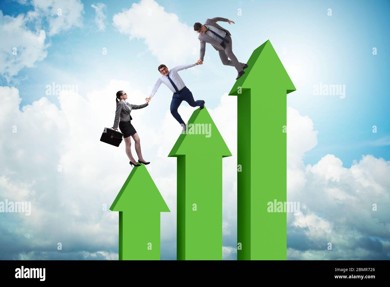 Colleagues helping each other to improve the results Stock Photo - Alamy