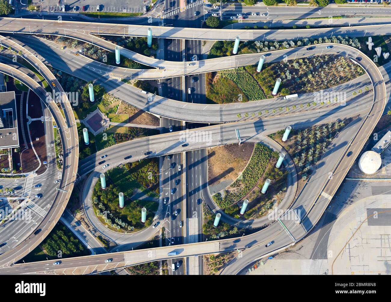 Iconic LAX Airport Gateway Pylon aerial view showing multiple road intersections and interchanges. Public art in form of columns. Los Angeles, CA, USA. Stock Photo