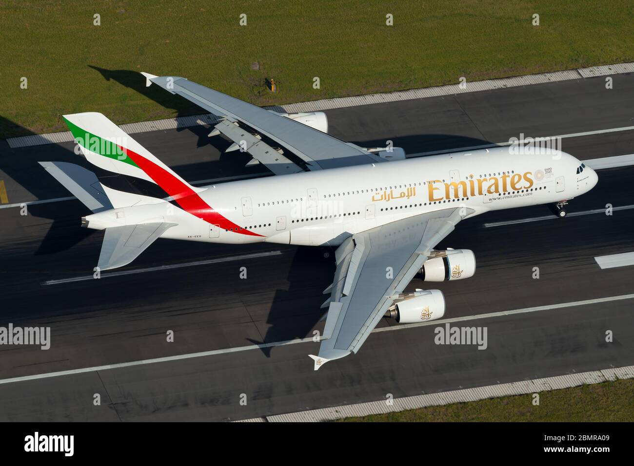 Emirates Airline Airbus A380 landing in Sydney Kingsford Smith international Airport in Australia. A380-800 A6-EEG deploying wing flaps and slats. Stock Photo