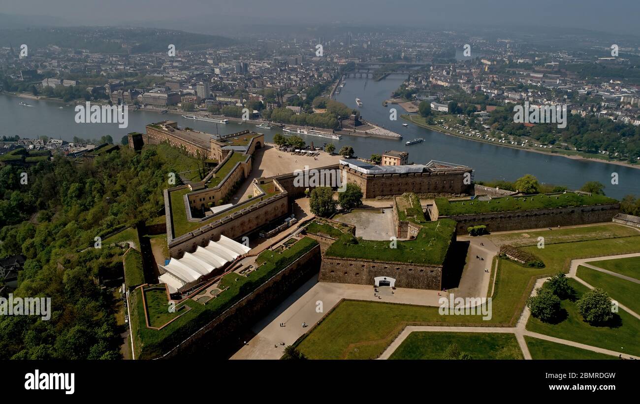 Koblenz, Germany. 30th Apr, 2020. Ehrenbreitstein Fortress, the largest  part of the major Koblenz fortress, is situated high above the Rhine with a  view of the city and the Deutsches Eck at