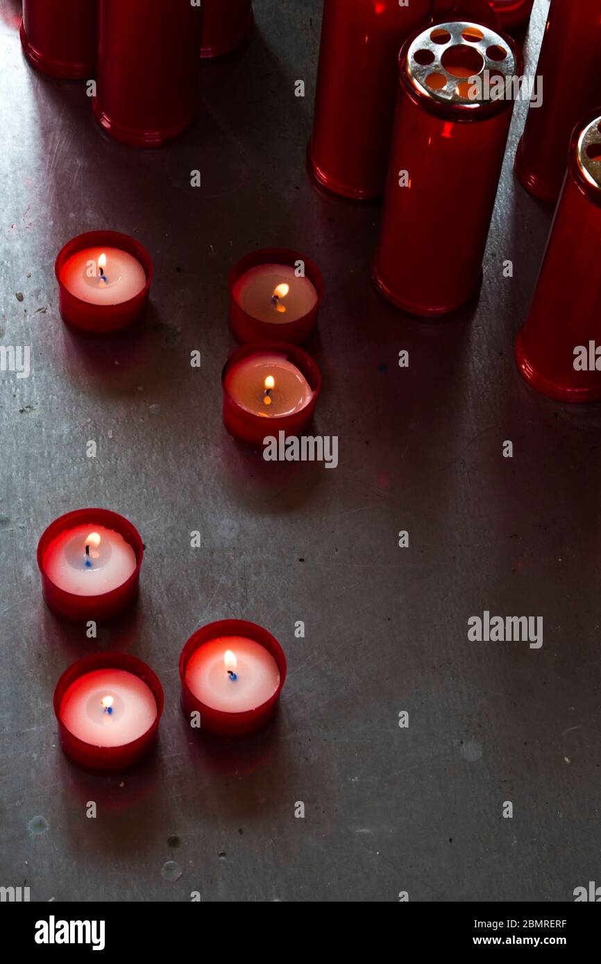 red candles that in the dark remind us of the deceased people we loved