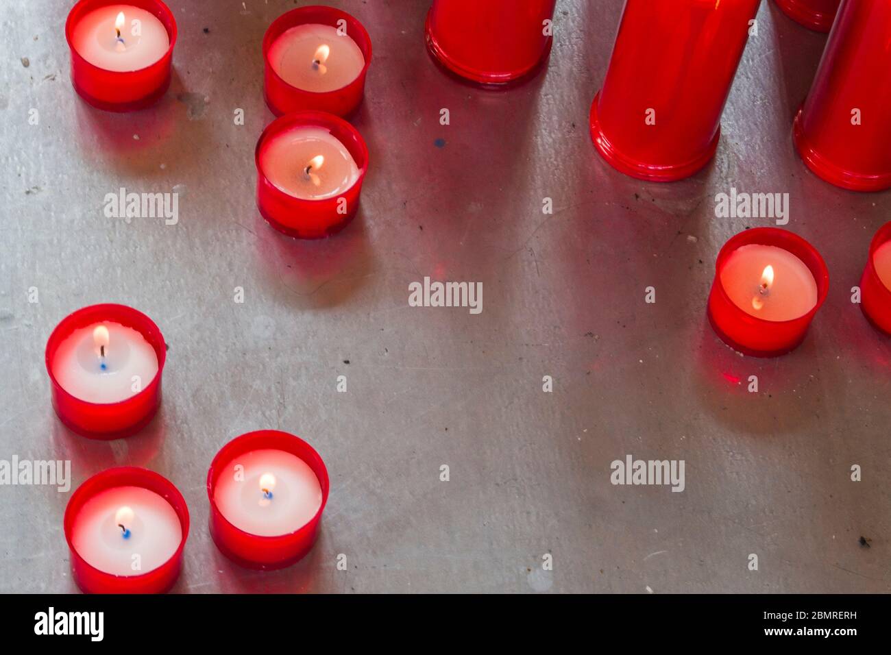 red candles that in the dark remind us of the deceased people we loved