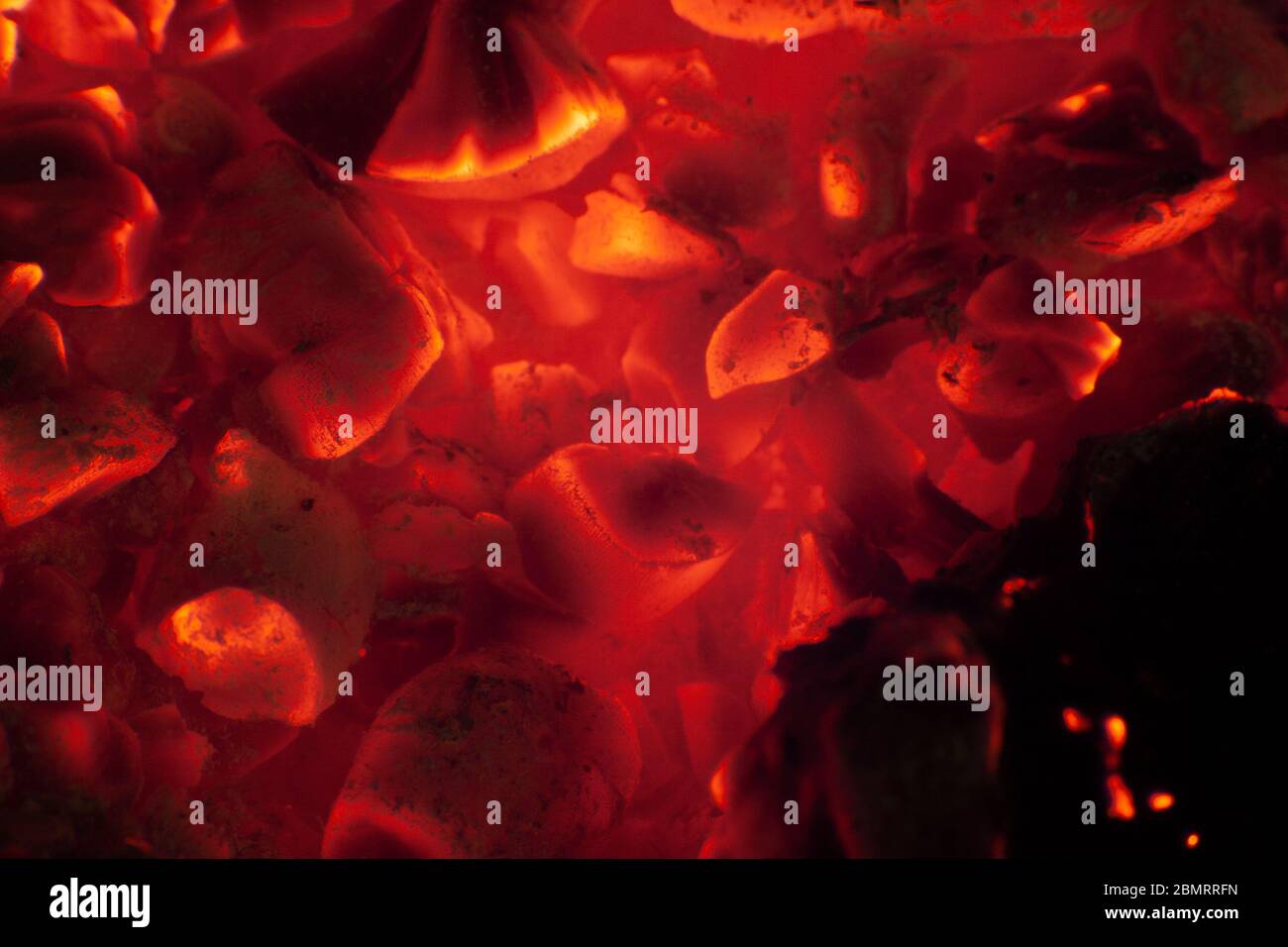Glowing hot bonfire wood embers Stock Photo