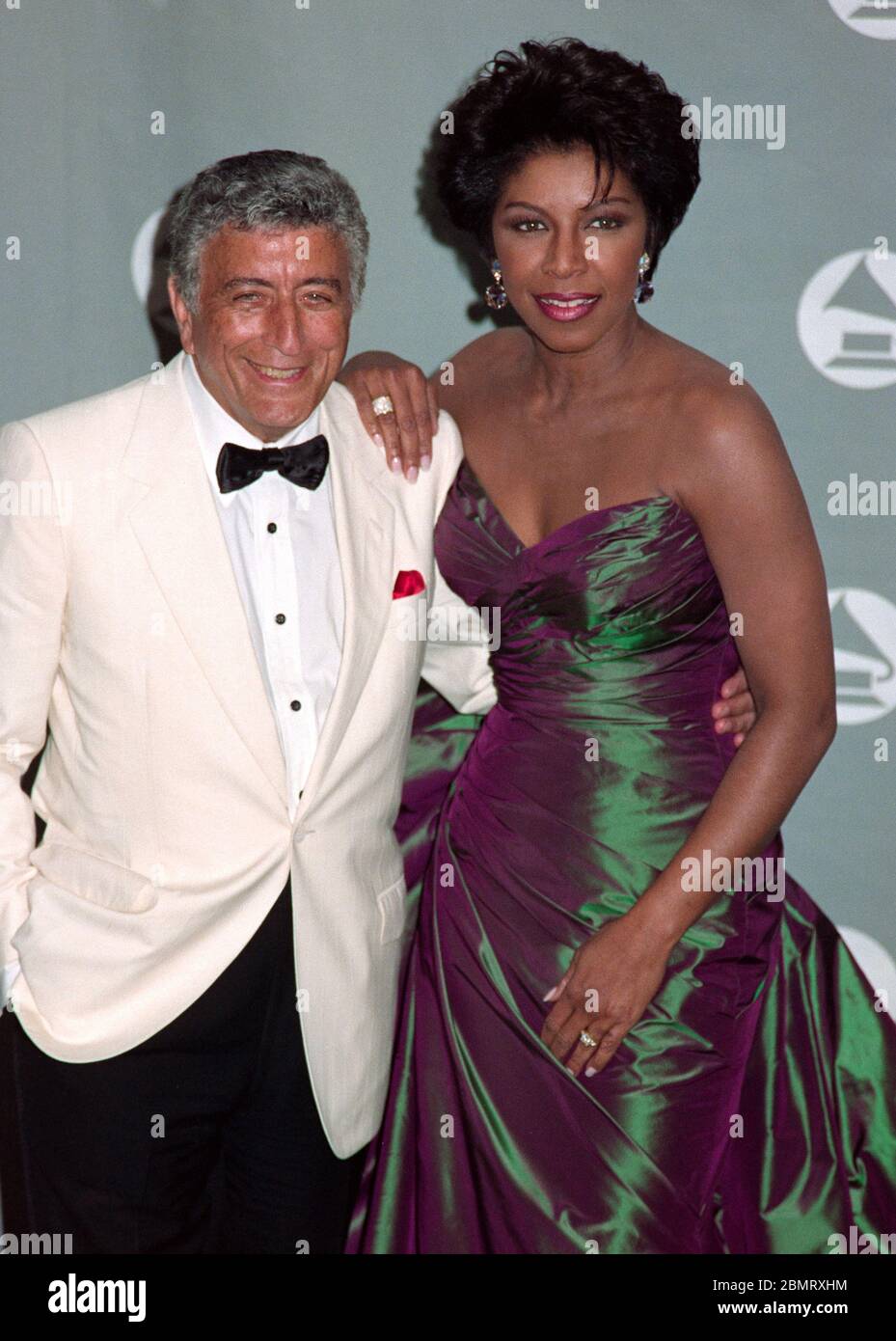 LOS ANGELES, CA. February 24, 1993:  Singers Natalie Cole & Tony Bennett at the 1993 Grammy Awards in Los Angeles.  File photo © Paul Smith/Featureflash Stock Photo