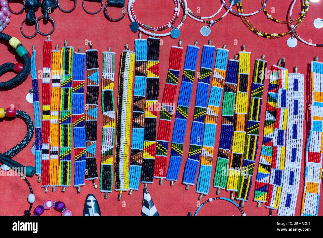 Tribal masai colorful bracelets for sale for tourists at the beach market, close up. Island of Zanzibar, Tanzania, East Africa Stock Photo