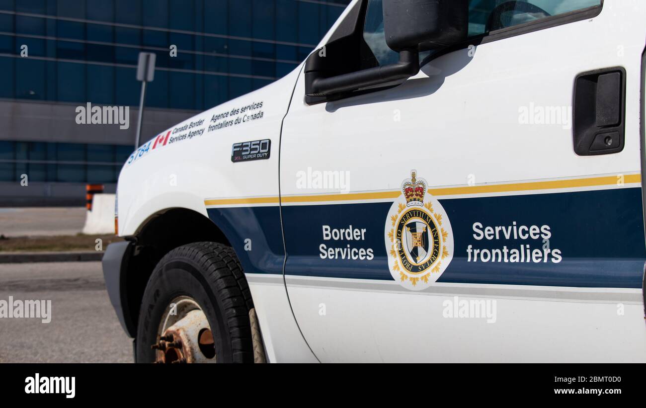 Canada Border Services Agency logo on the side of a patrol car at Toronto Pearson Airport. Stock Photo