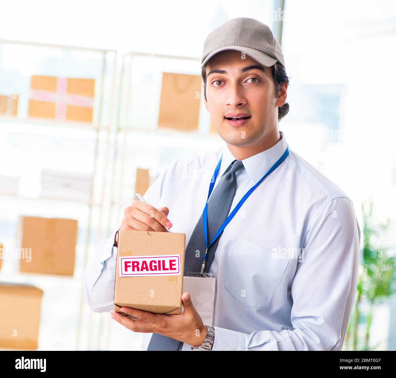 The male employee working in box delivery relocation service Stock Photo Alamy
