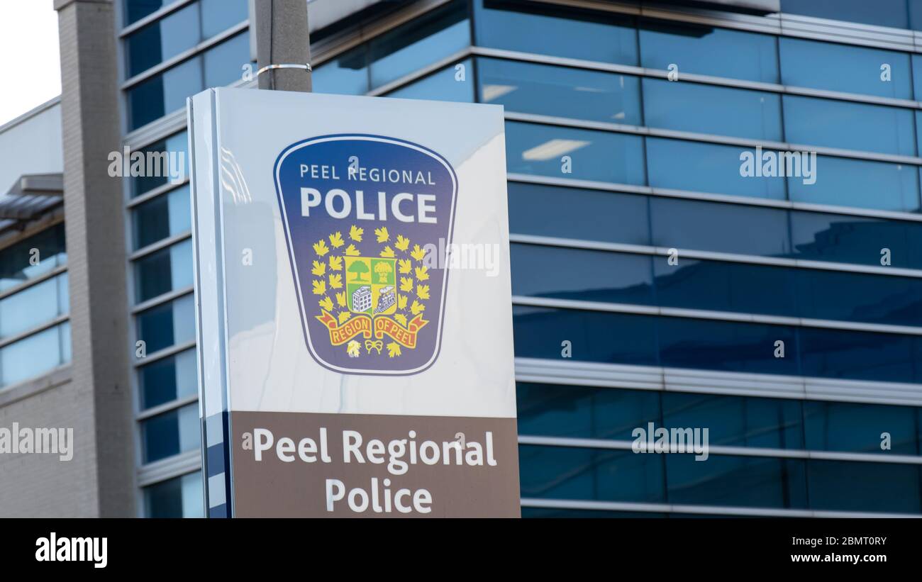 Peel Regional Police badge and text on a sign out-front of a police station near Toronto Pearson in Mississauga. Stock Photo