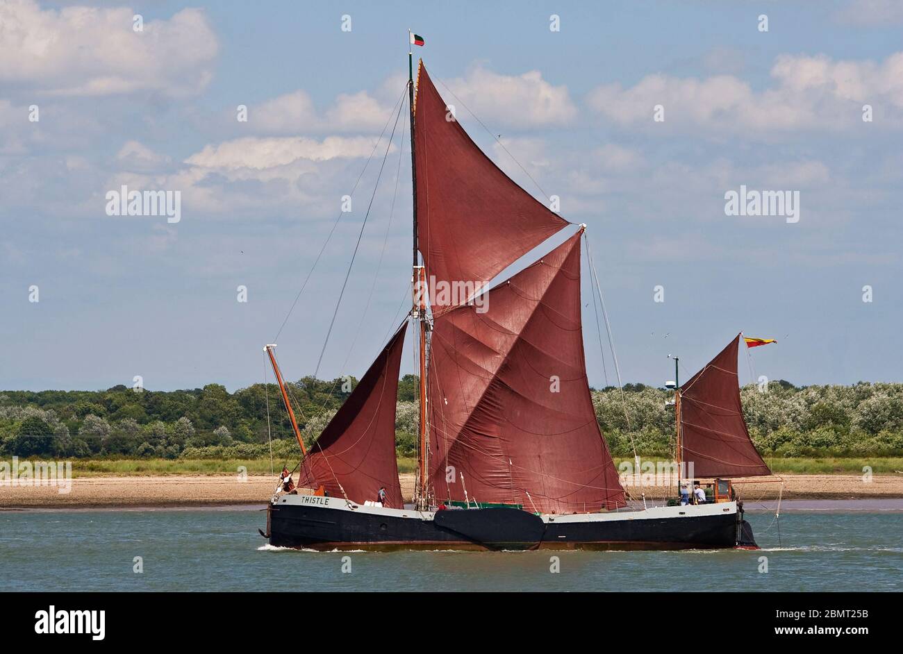 The Thames sailing barges Thistle in full sail Stock Photo Alamy