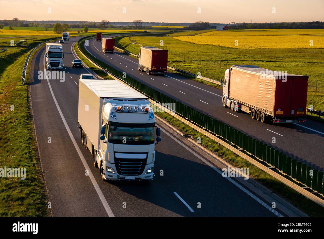 Heavy Truck Traffic On The Highway In The Evening Stock Photo Alamy Figure and pay the tax due on highway motor vehicles used during the period with a taxable gross weight of 55,000 pounds or more; alamy