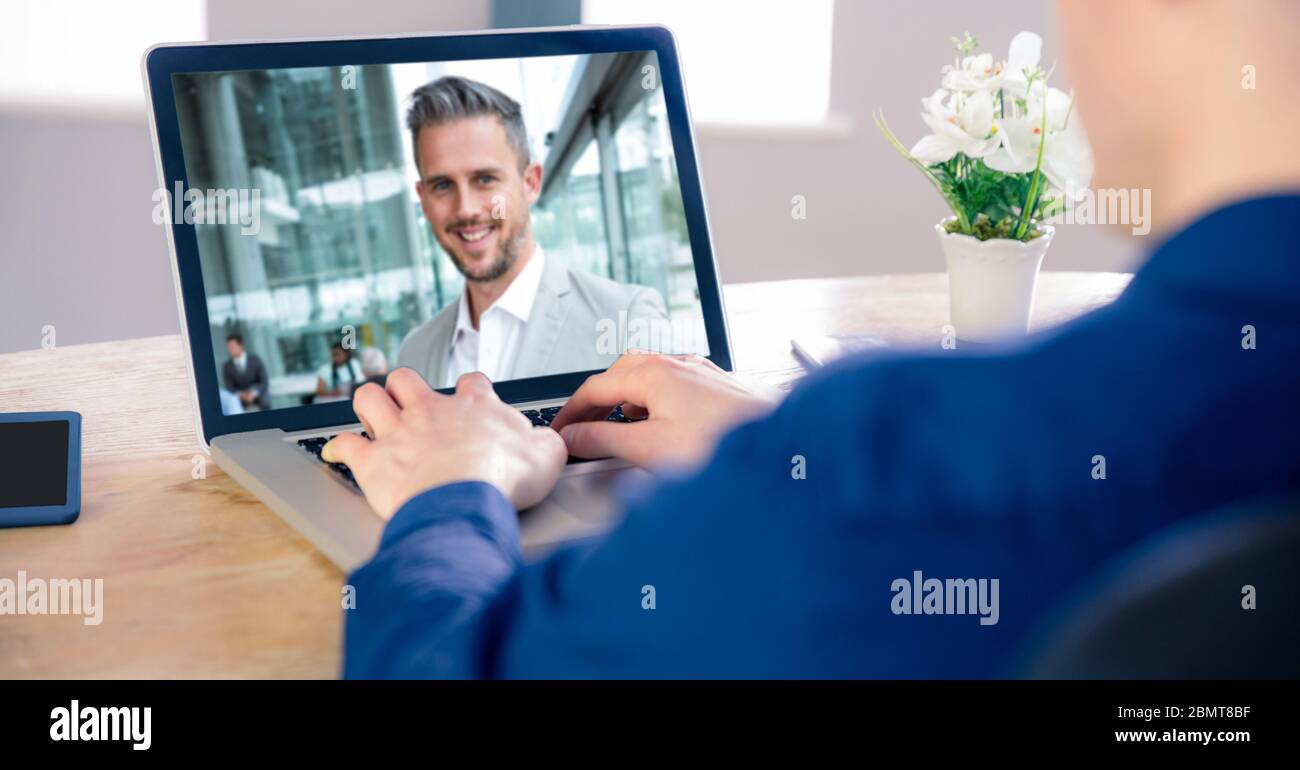Man having video call on laptop. Stock Photo